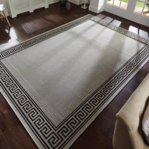 Light rug on dark coloured floor