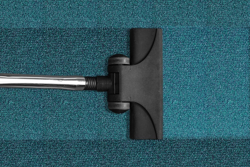 Vacuuming a rug