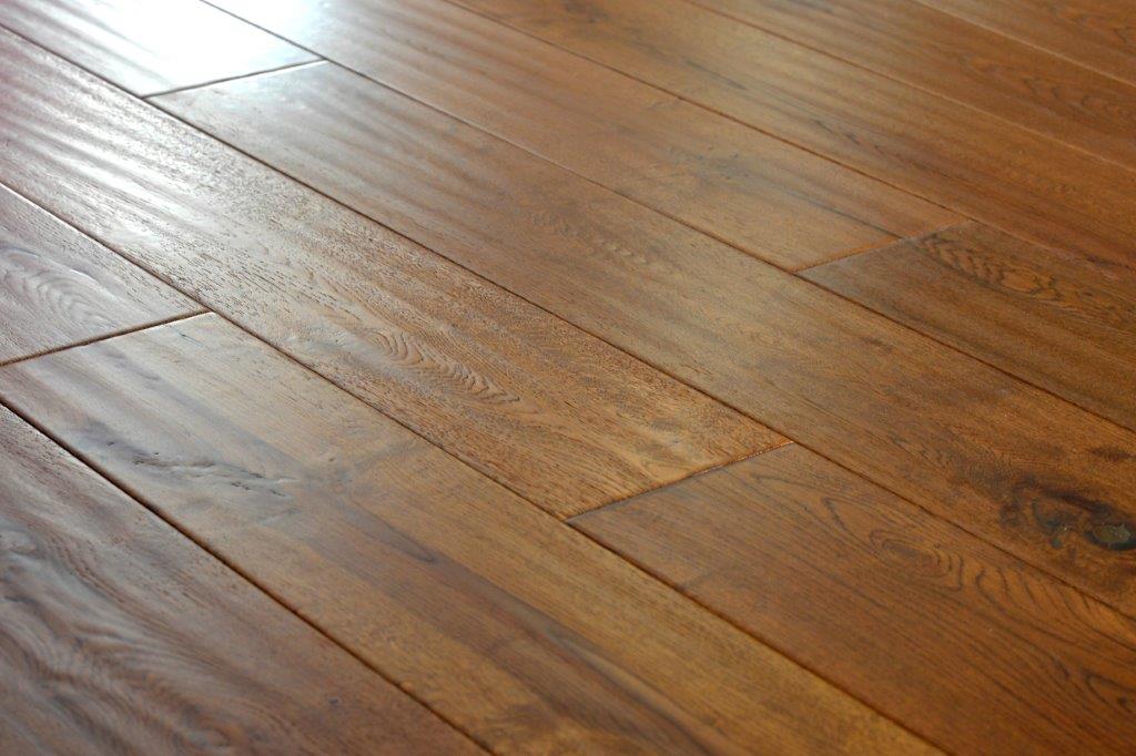 What are the different finishes on solid & engineered wood floors?